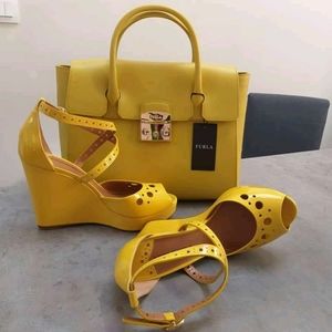 A Shoe and a hand bag